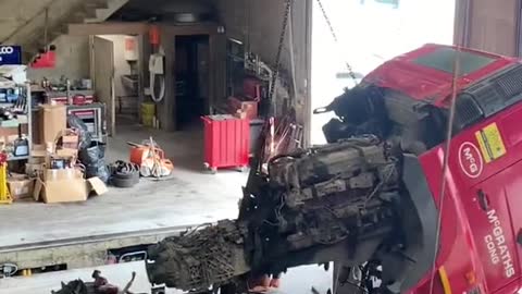 The repair shop maintains a large truck.