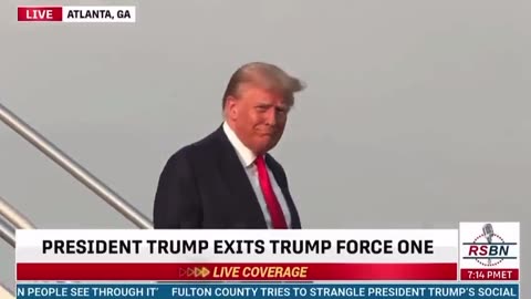BREAKING: Donald Trump gives a smile and a thumbs up as he deplanes in Atlanta