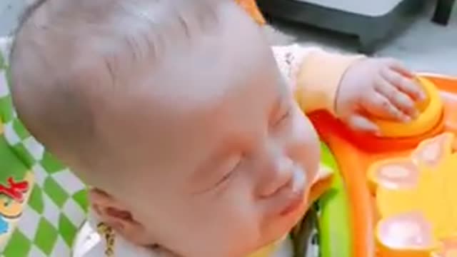 Baby loves to practice spraying rain