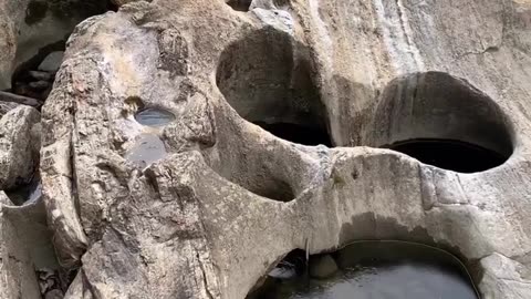 WATER MADE HOLES IN ROCK