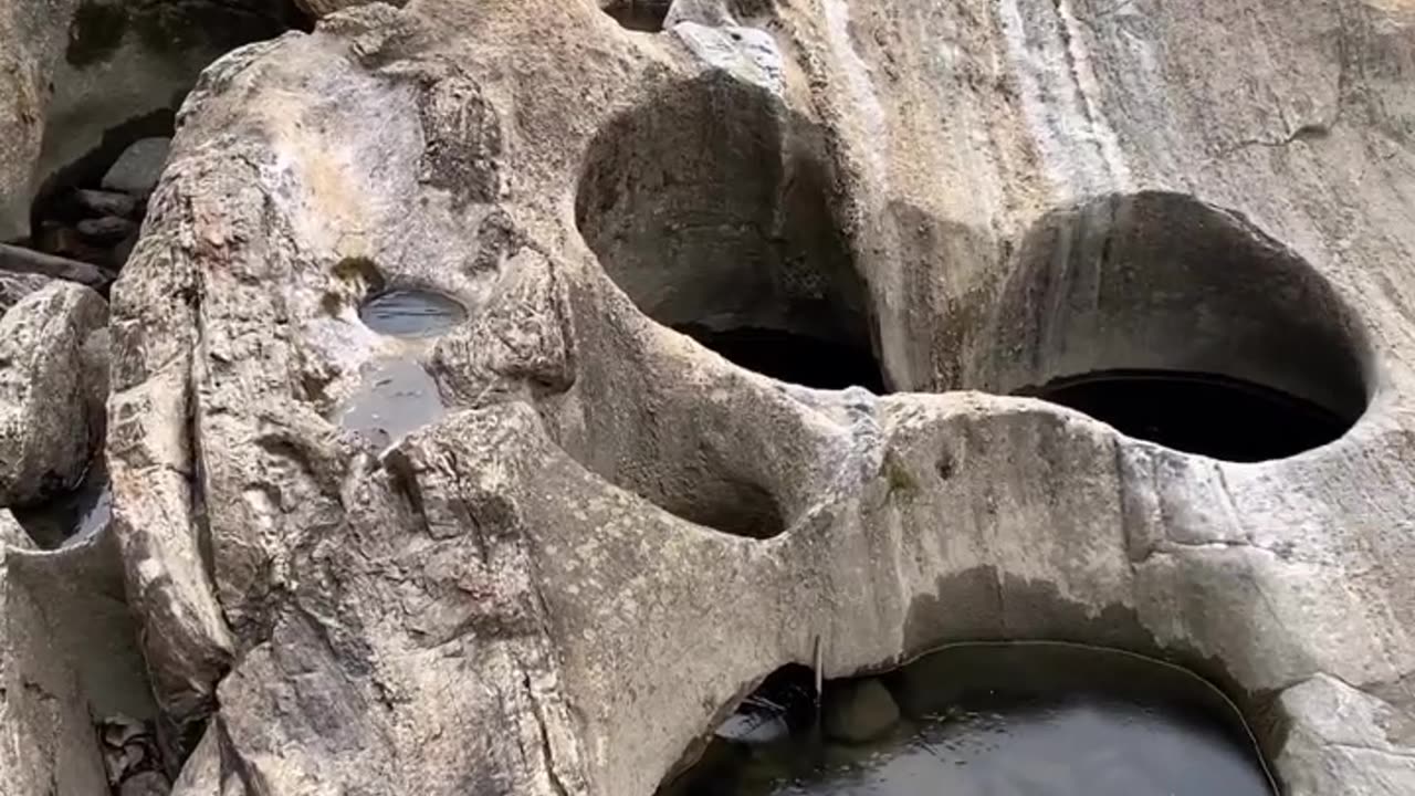 WATER MADE HOLES IN ROCK