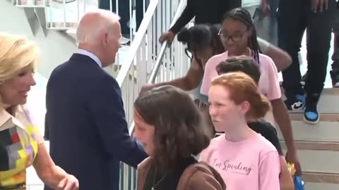 Joe Biden coughs all over kids at School. Who needs Masks?