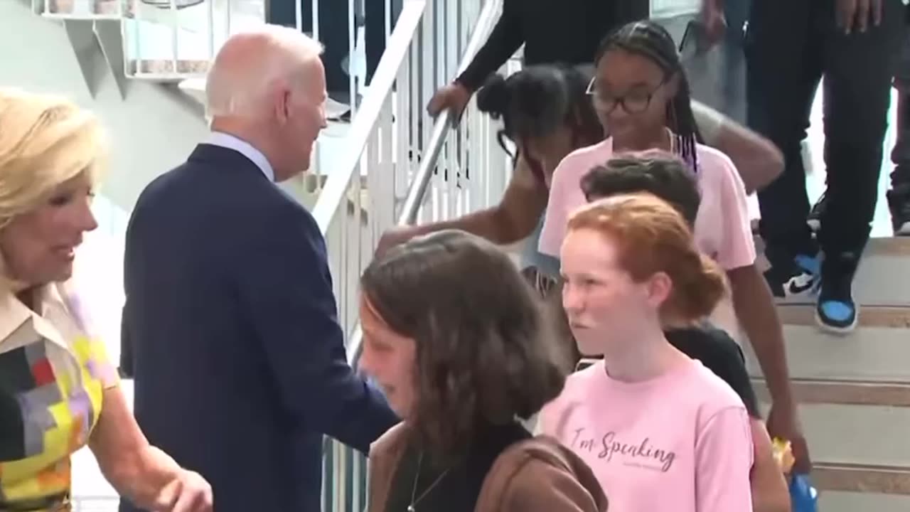 Joe Biden coughs all over kids at School. Who needs Masks?