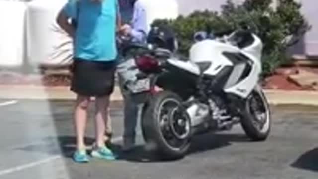 Old couple with a bike