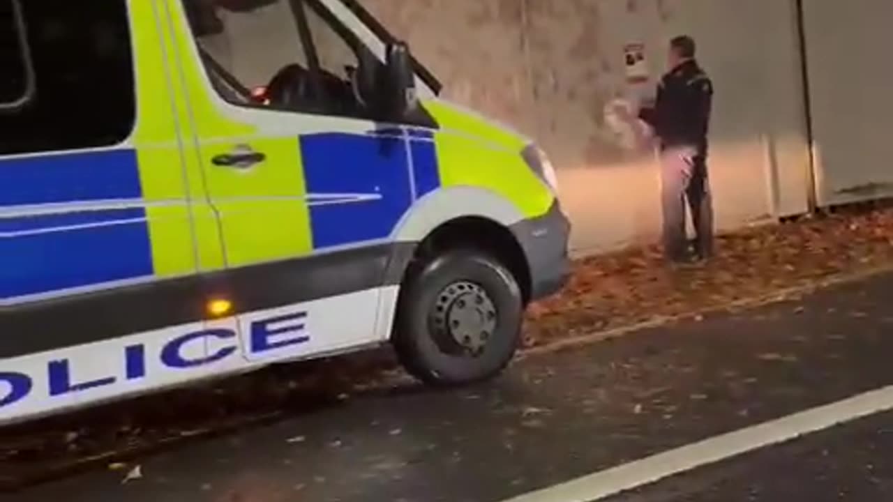 Greater Manchester Police ripping posters of abducted Jewish children (cowards)