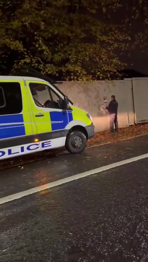 Greater Manchester Police ripping posters of abducted Jewish children (cowards)