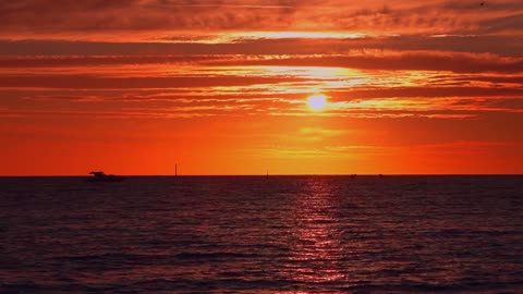 Sunset on the beach is calming for the soul