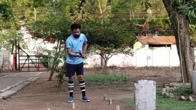 Guy Shows Various Impressive Hockey Tricks While Practicing In Backyard