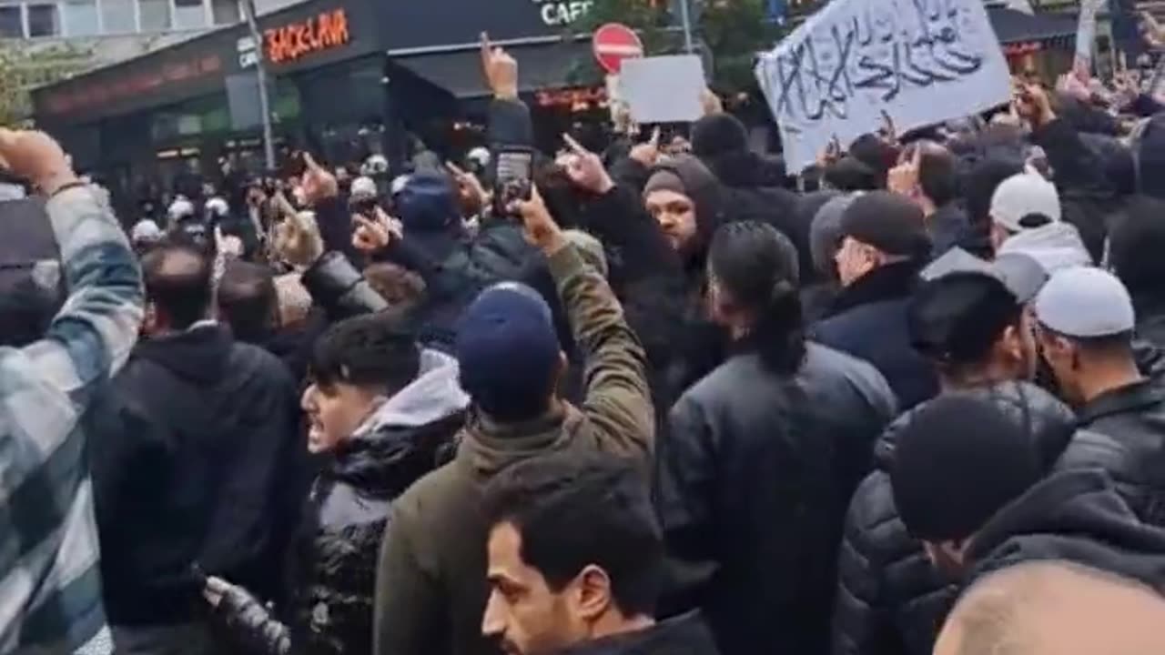 Anti-Israel protest in Hamburg, Germany. Takuban flags in the crowd
