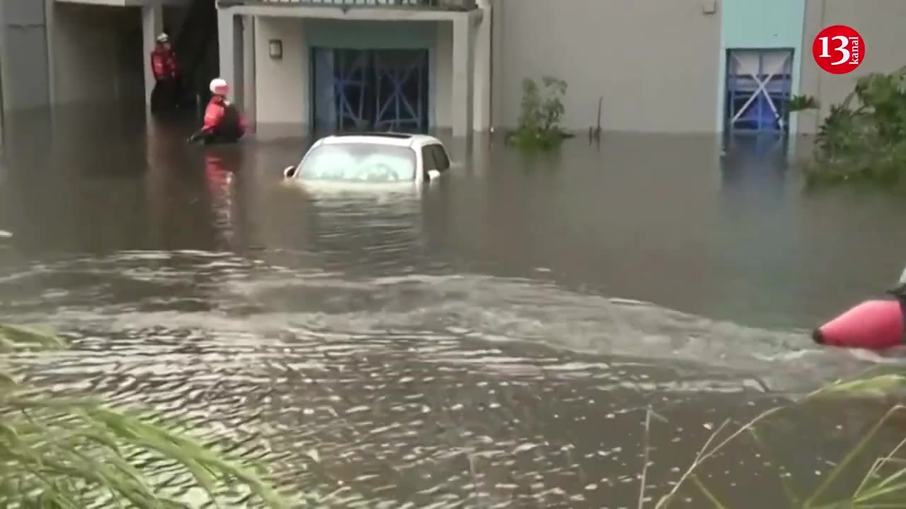 First responders help residents escape from the high waters of Hurricane Milton