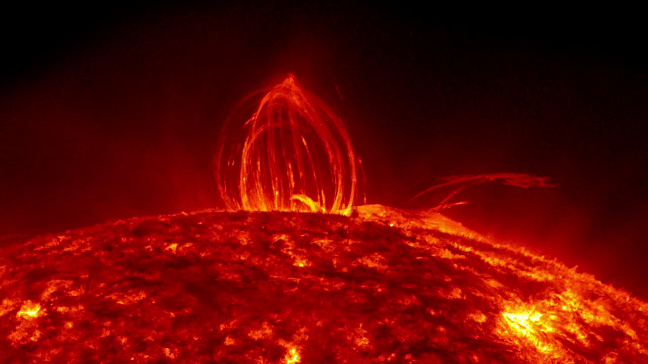 (SUN) SDO Sees Fiery Looping Rain on the SUN