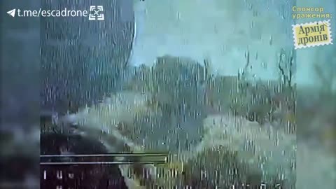 Ukrainian FPV kamikaze drone approaches a Russian BMP slowly, landing into a hatch