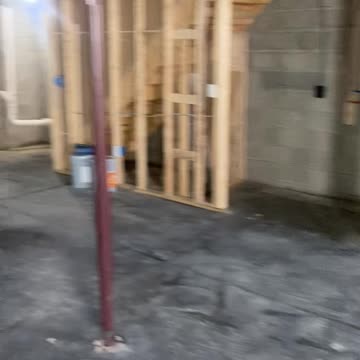 looking at this new build basement with an egress window