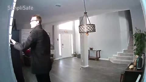 Very Tall Man Casually Walks Into A Chandelier