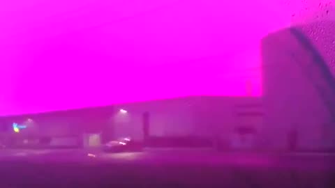 Morning Drive Under Eerie Magenta Sky