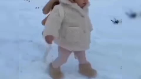 Cute baby enjoying snowfall😱😱😱🌄