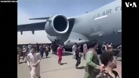 AFGHANISTAN: Afghans fell from wing of departing American plane as Taliban take power in Kabul