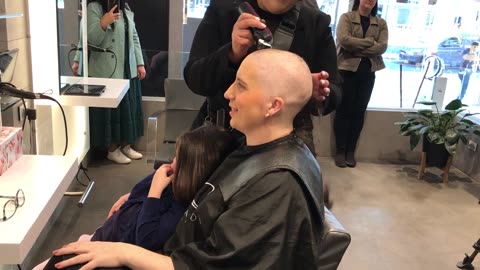 Giulia Jones uses chemo head shave to raise funds