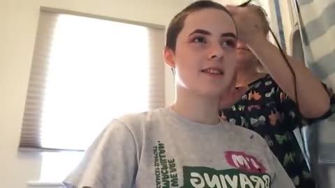 My daughter shaving her hair off for Macmillan cancer support