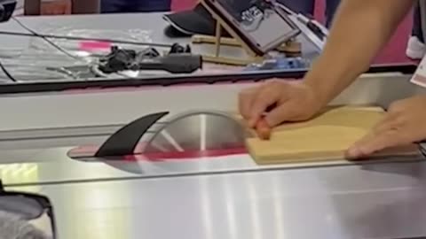 Download SawStop Table saw hotdog test in slow motion from IWF and Rockler event