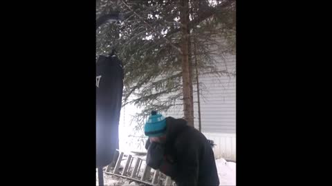 Hitting FROZEN SOLID Everlast 100 lbs Heavy Bag with 16oz gloves