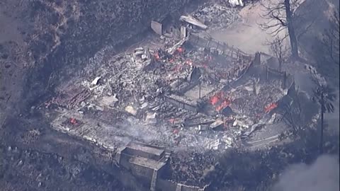 Hillside fire in California's San Bernardino razes homes