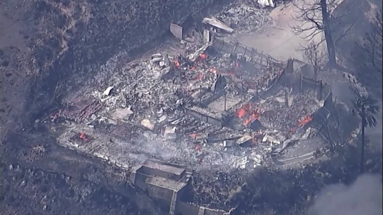 Hillside fire in California's San Bernardino razes homes