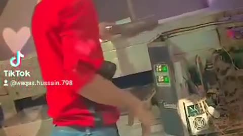 pizza worker making