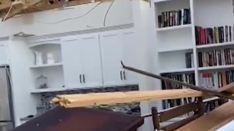 Kentucky man plays in home destroyed by