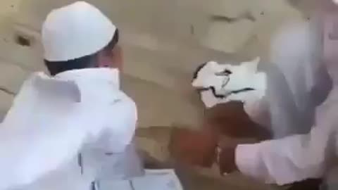 Boy beat with stick for error in reciting the Quran