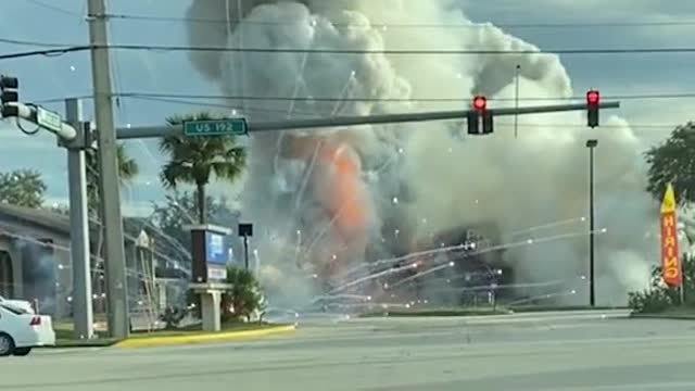A fireworks store in Florida erupted into flames after an SUV crashed into it