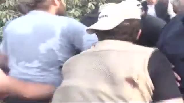 People carry Pakistan's former PM Imran Khan after he was shot