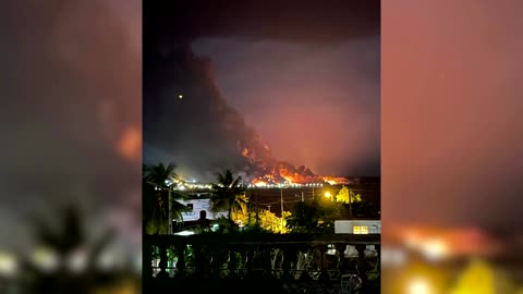 Fire rises above fuel tanks after explosion in Cuba
