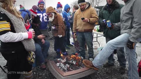 Bills Fan Runs Into MASSIVE FIRE PIT