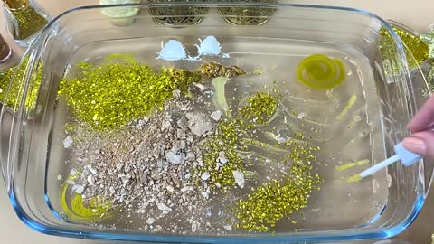 GOLD SLIME | Mixing makeup and glitter into Clear Slime | Satisfying Slime Videos