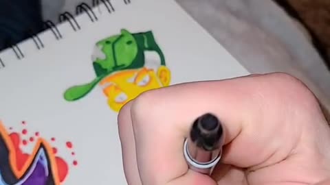 Drawing graffiti character head.