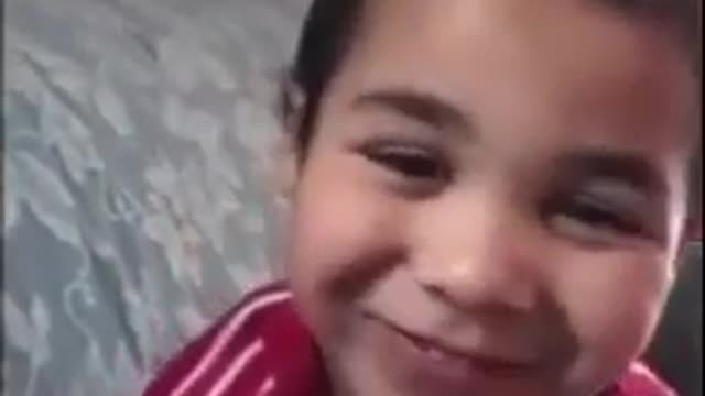LITTLE BOY SINGING BOB MARLEY'S SONG