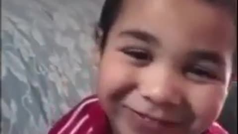 LITTLE BOY SINGING BOB MARLEY'S SONG
