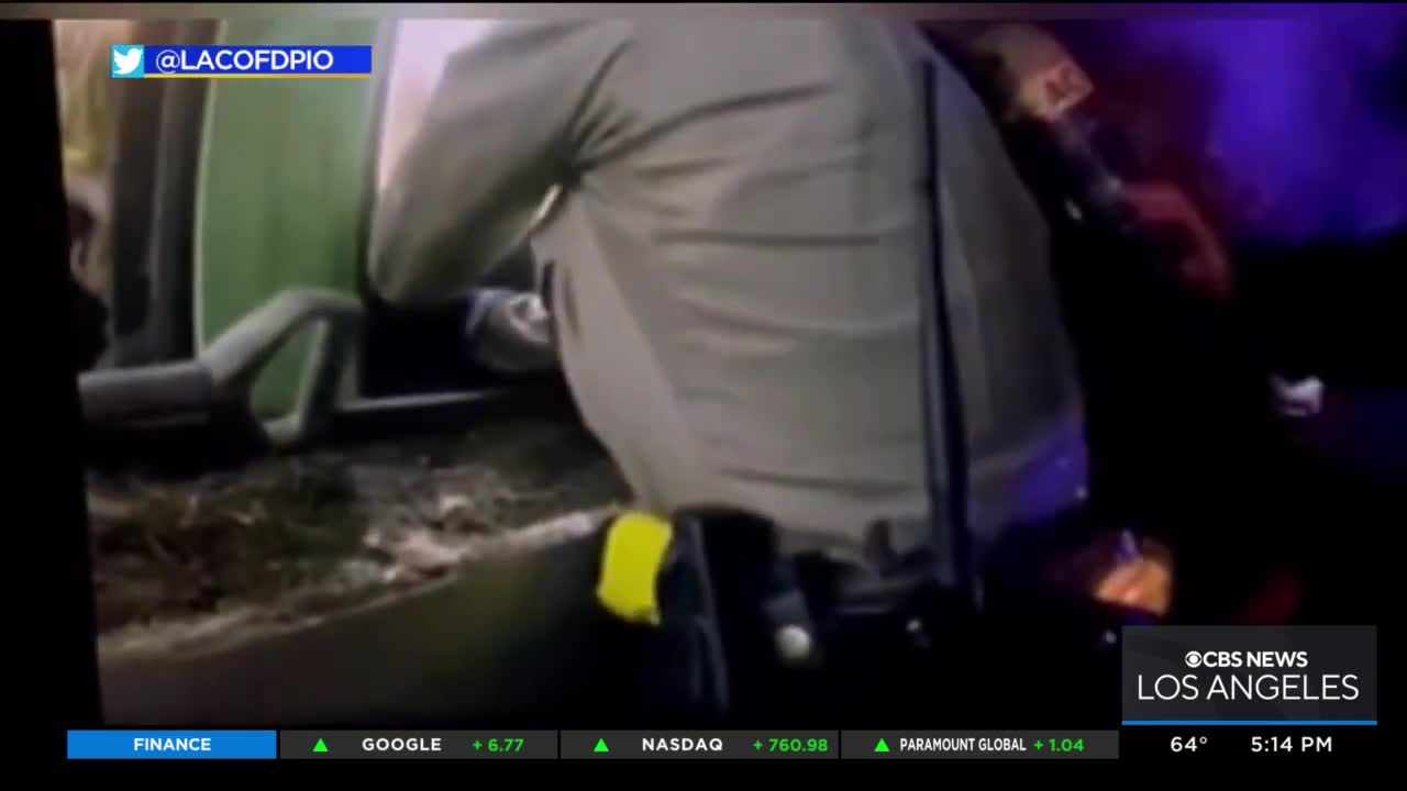 Dramatic video shows firefighters pulling man from burning home in Lancaster