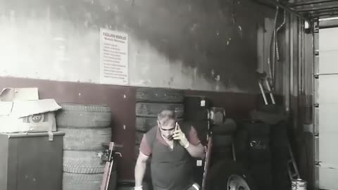 Car repairers install car tires