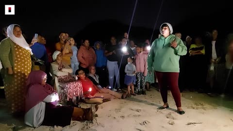 Watch: Candlelight Vigil for Missing German Tourist