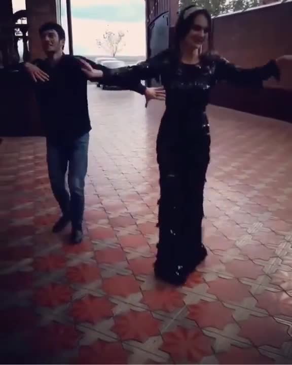 A girl at a wedding dances a Super Incendiary Lezginka