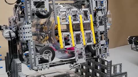 Humans are very clever. A washing machine from Lego parts that washes, dries and irons clothes.