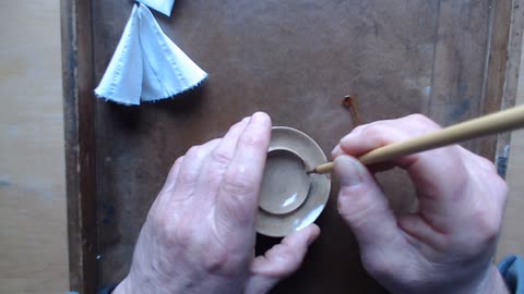Traditional, lacquer based kintsugi, step 3, second hardening lacquer with a Japanese made lacquer