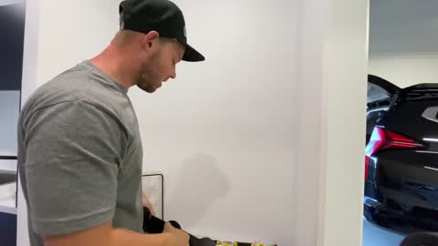 How to install a coat or hat rack with hollow wall anchors with m12 Milwaukee impact driver