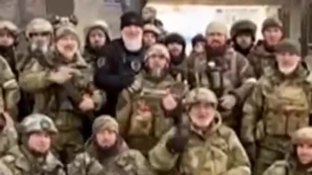 Chechen commander leads his men at front