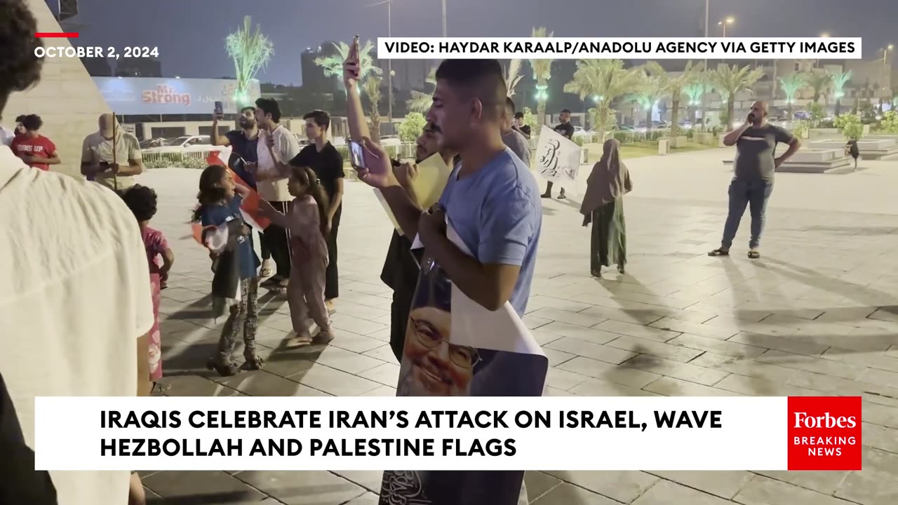 Iraqis Gather In Baghdad's Liberation Square In Celebration Of Iran's Missile Attack On Israel