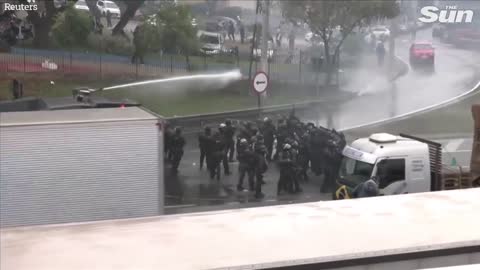 Brazilian police fire water cannons and rubber bullets at anti Lula protesters