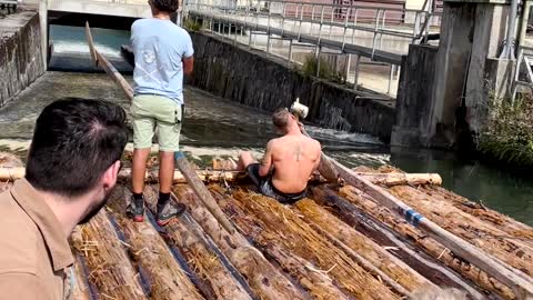 Log Raft Going Down Slide into River