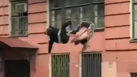 Couple Fights on Balcony